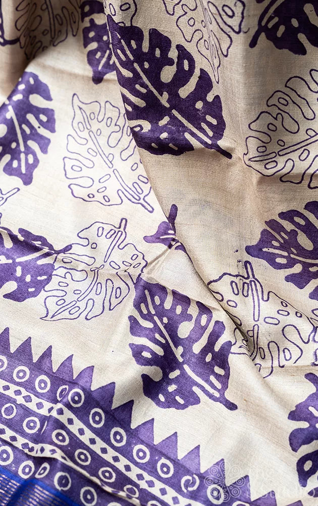 Off white tussar silk saree with violet leaf prints