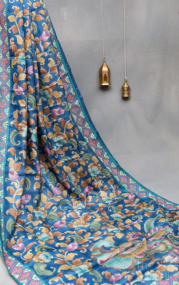 Navy blue hand-painted kalamkari tussar silk saree with kutch embroidery border