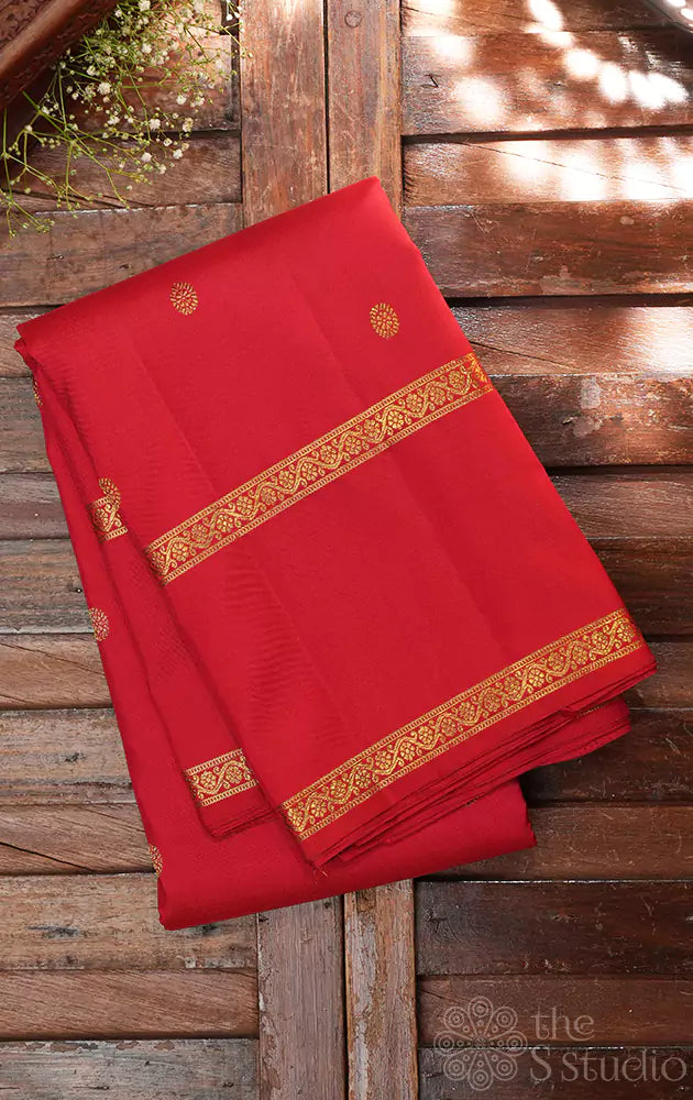 Red kanchi silk saree with small buttas and rettai pet border