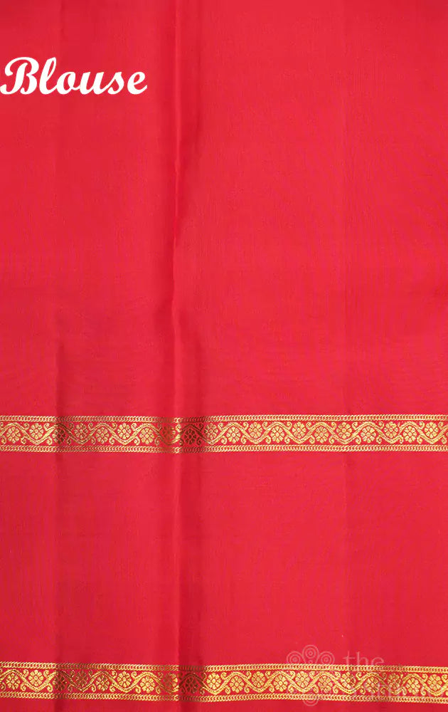 Red kanchi silk saree with small buttas and rettai pet border