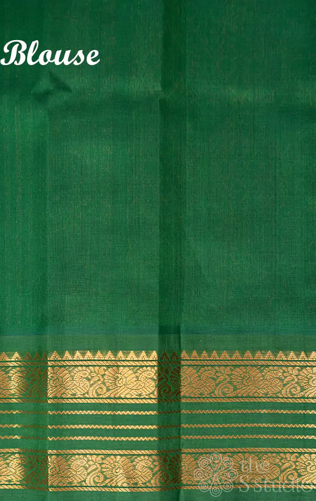 Light peach silk cotton saree with green rettaipet border