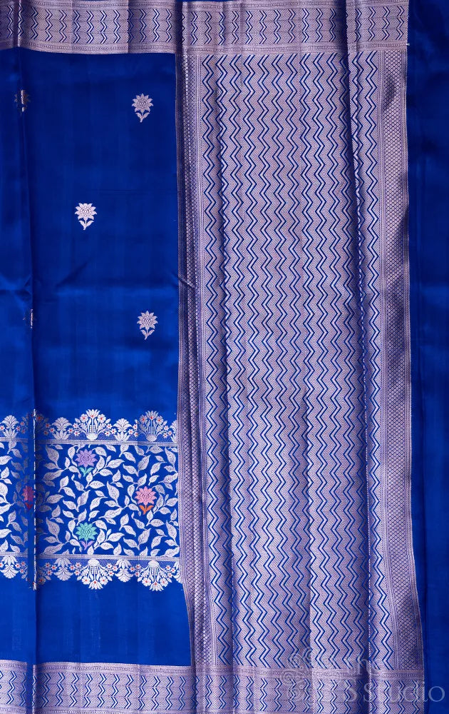 Navy blue chiniya banarasi silk saree with floral silver zari work