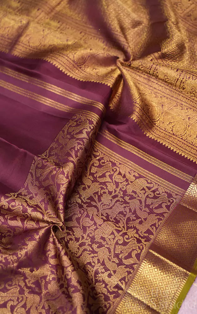 Brown kanjivaram silk saree with vanasinghram border