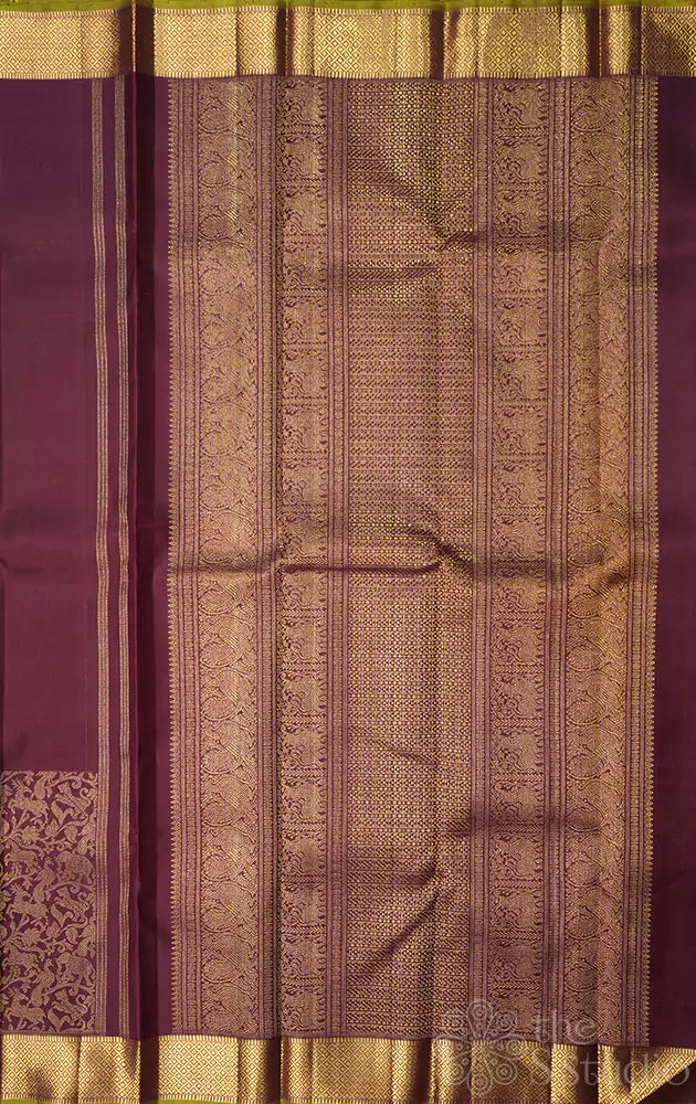 Brown kanjivaram silk saree with vanasinghram border