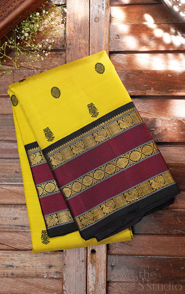 Sampanga green kanjivaram saree with black and maroon border