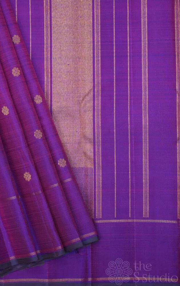 Purple kanjivaram silk saree with small buttas and rettai pet border