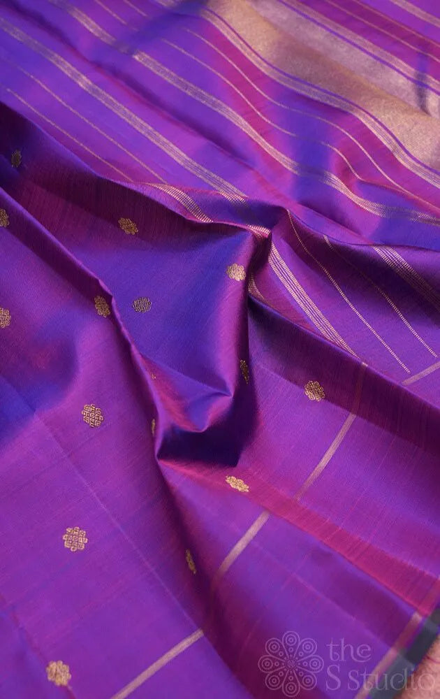 Purple kanjivaram silk saree with small buttas and rettai pet border
