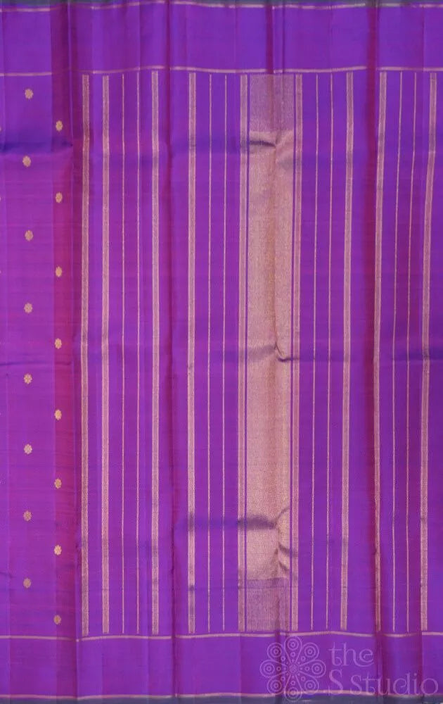Purple kanjivaram silk saree with small buttas and rettai pet border