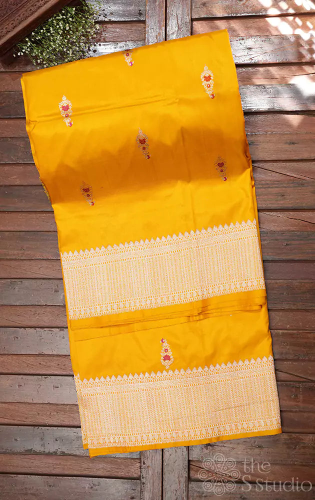 Mustard katan banarasi silk saree adorned with kadwa butta