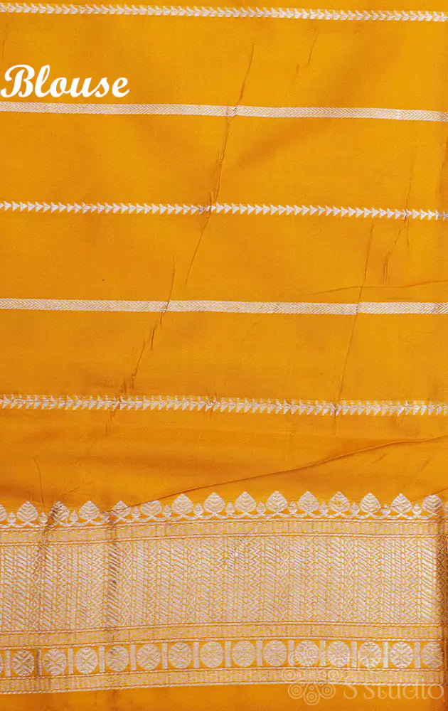 Mustard katan banarasi silk saree adorned with kadwa butta
