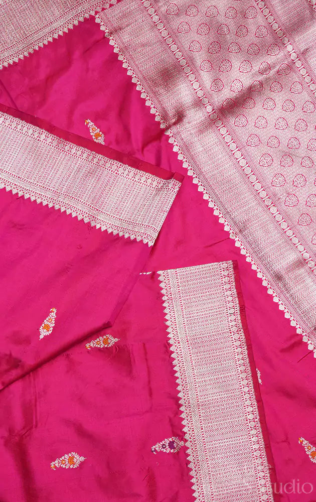 Rani pink katan banarasi silk saree adorned with kadwa butta