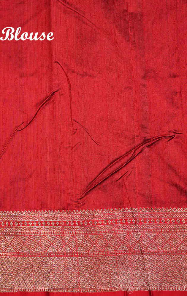 Blue raw silk saree with small zari buttas and contrast red border
