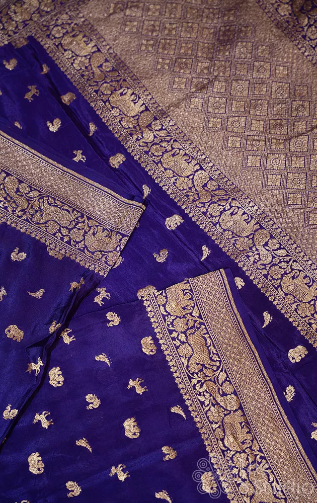 Violet crepe banarasi silk saree with antique zari buttas and border