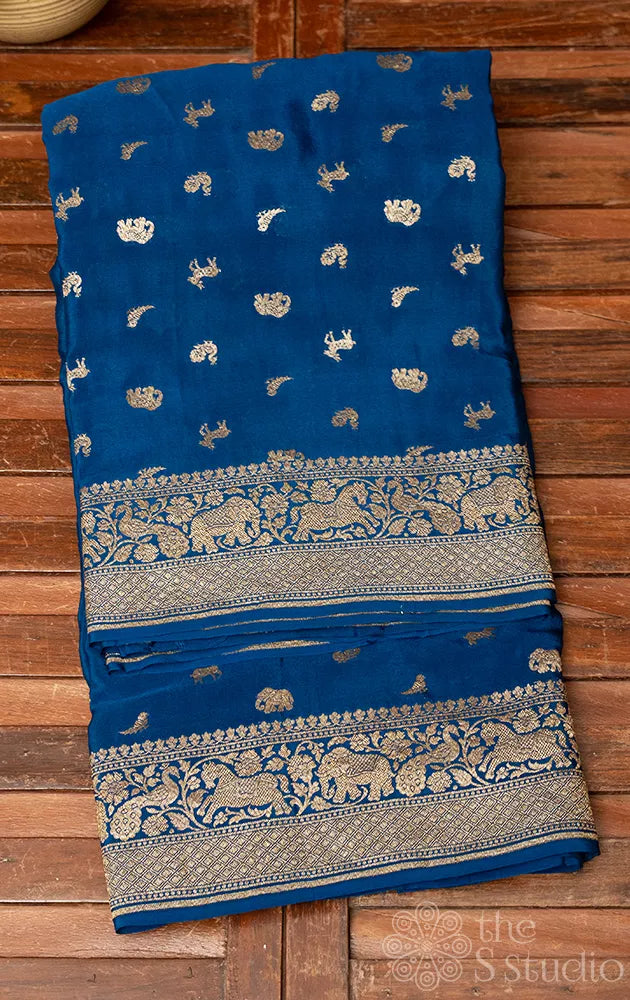 Peacock blue crepe banarasi silk saree with antique zari buttas