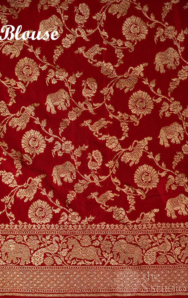 Peacock blue crepe banarasi silk saree with antique zari buttas