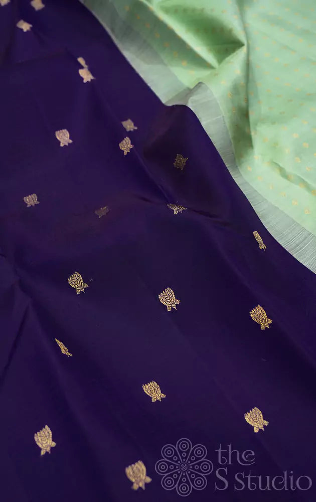 Aubergine violet kanchipuram silk saree with lotus motifs
