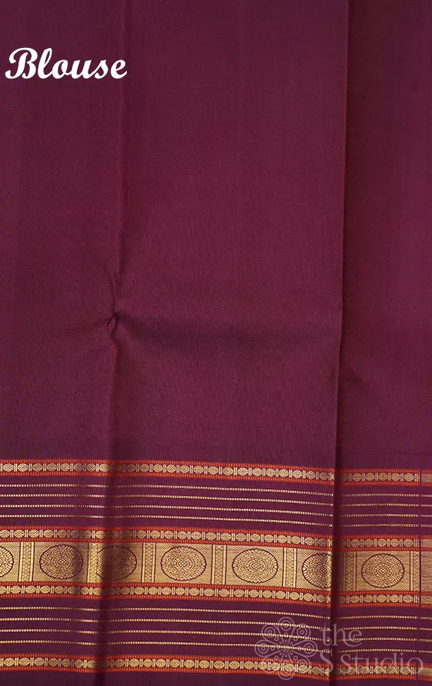 Brown zari checked kanchipuram silk saree with yazhi and peacock motifs