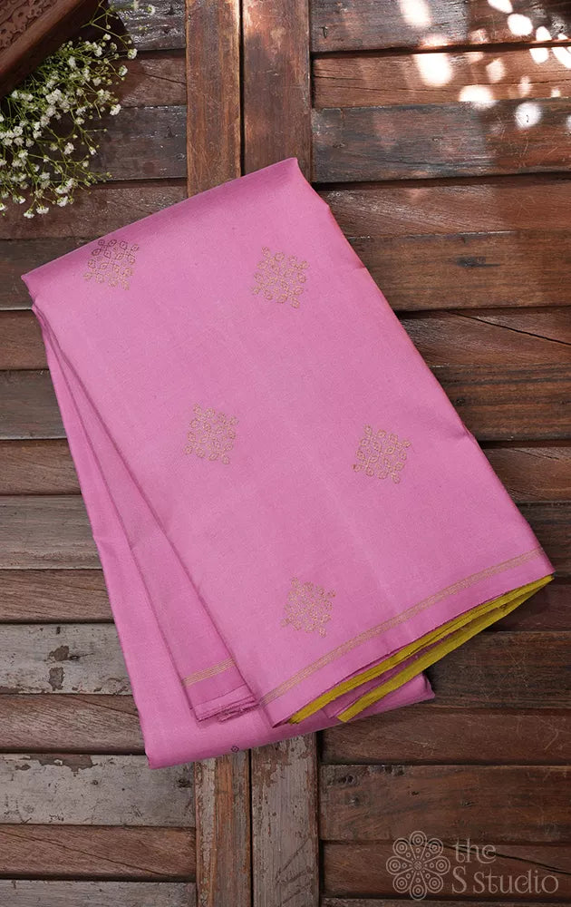 Light pink kanjivaram silk saree with kolam buttas