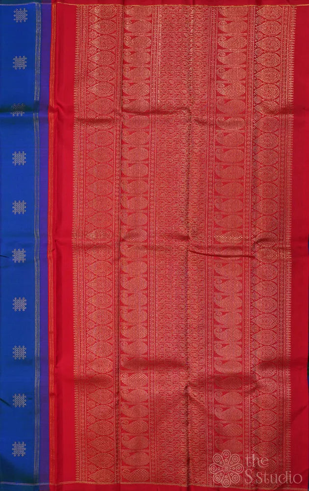 Peacock blue borderless kanchi silk saree with kolam buttas