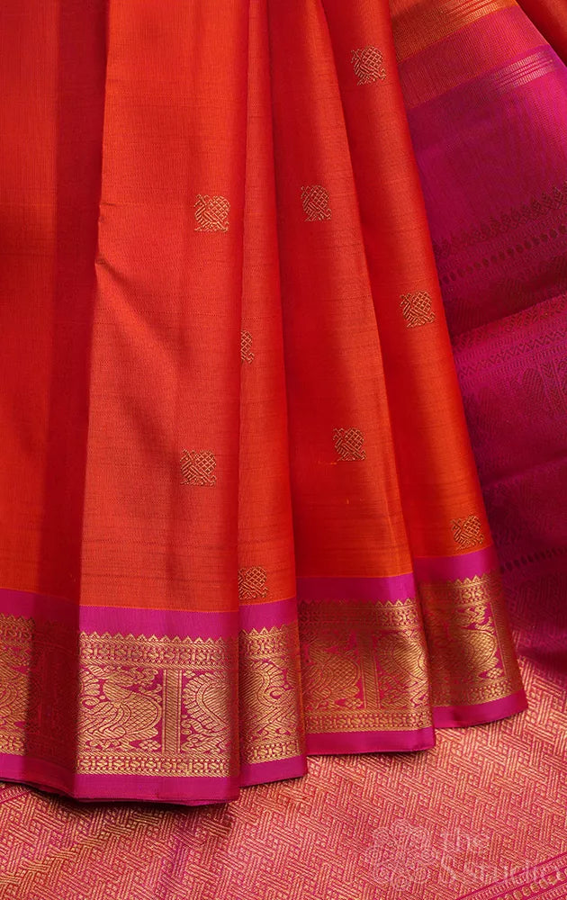 Orange kanjivaram silk saree with small rani pink border