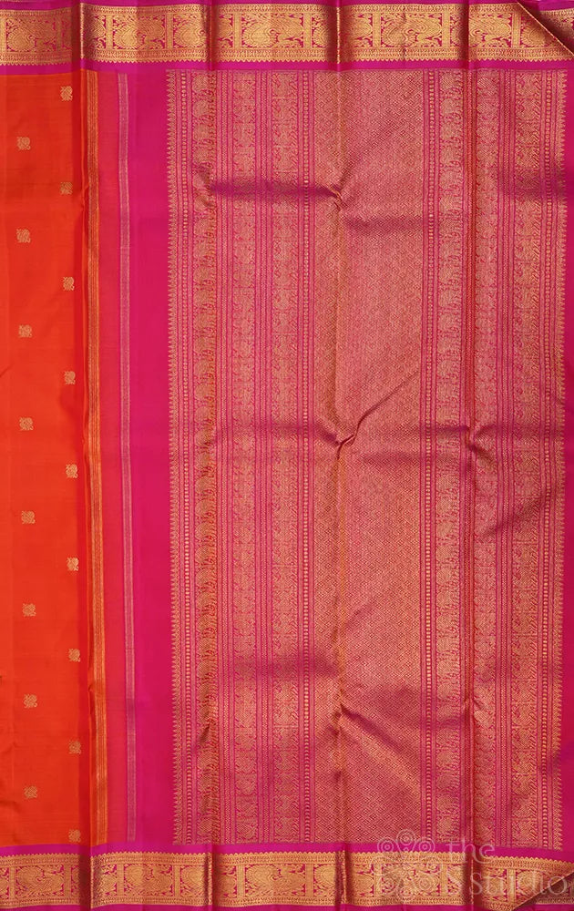 Orange kanjivaram silk saree with small rani pink border