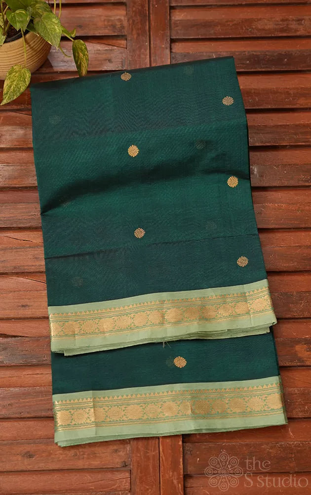 Bottle green silk cotton saree with small zari border