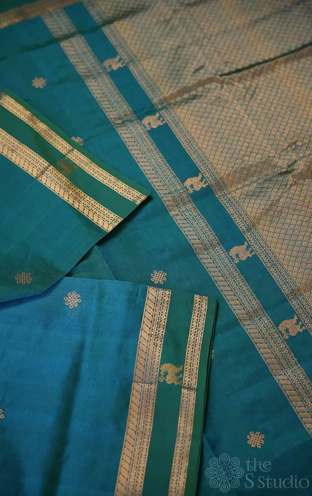 Teal blue silk cotton saree with rettai pet border