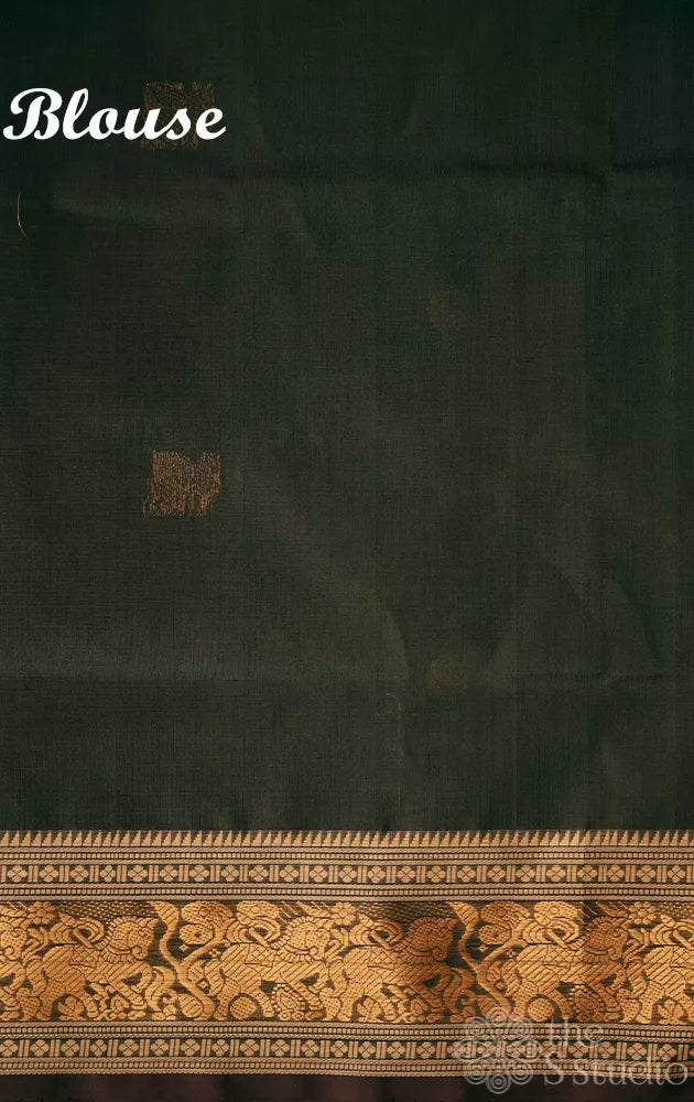 Dark green handloom silk cotton saree with small zari border