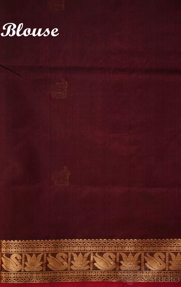 Maroon handwoven silk cotton saree with pichwai motifs