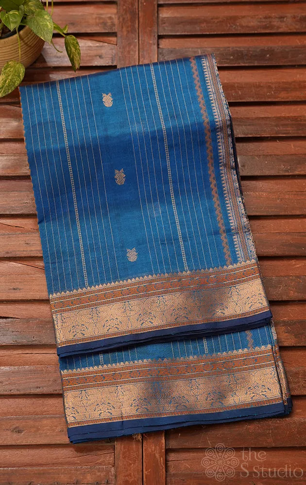 Blue silk cotton saree with vertical lines and zari border