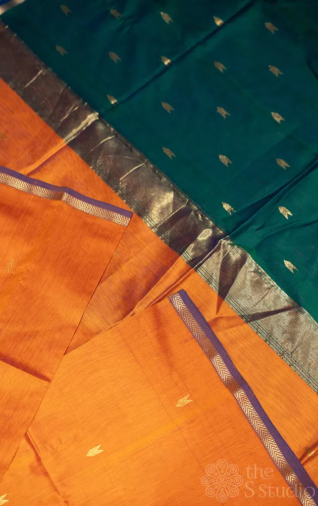 Rust orange maheshwari silk cotton saree with green pallu