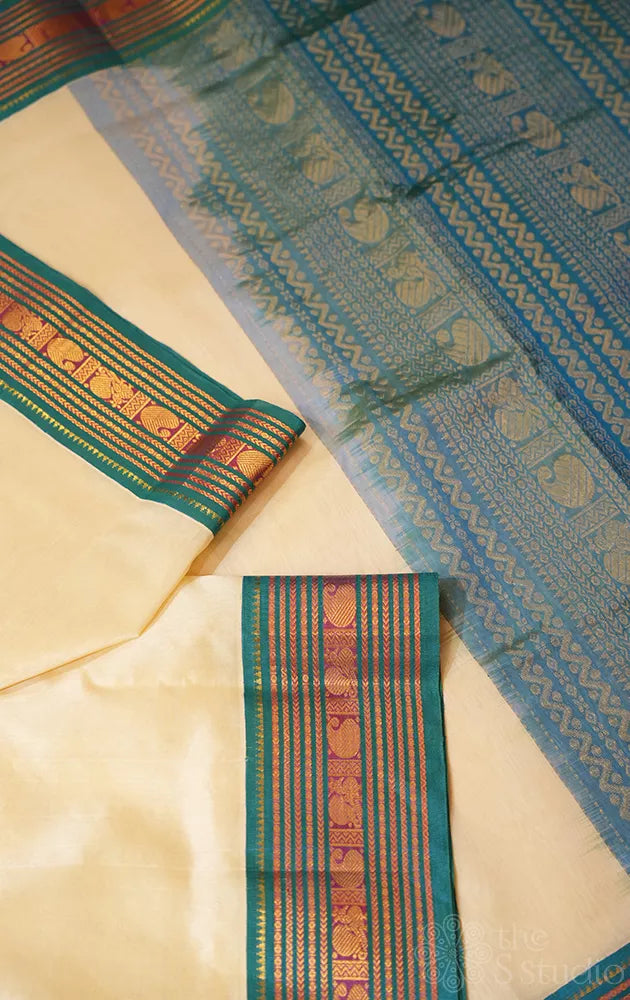 Off white with teal blue korvai border silk cotton saree