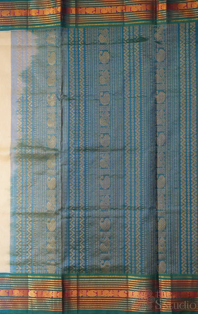 Off white with teal blue korvai border silk cotton saree