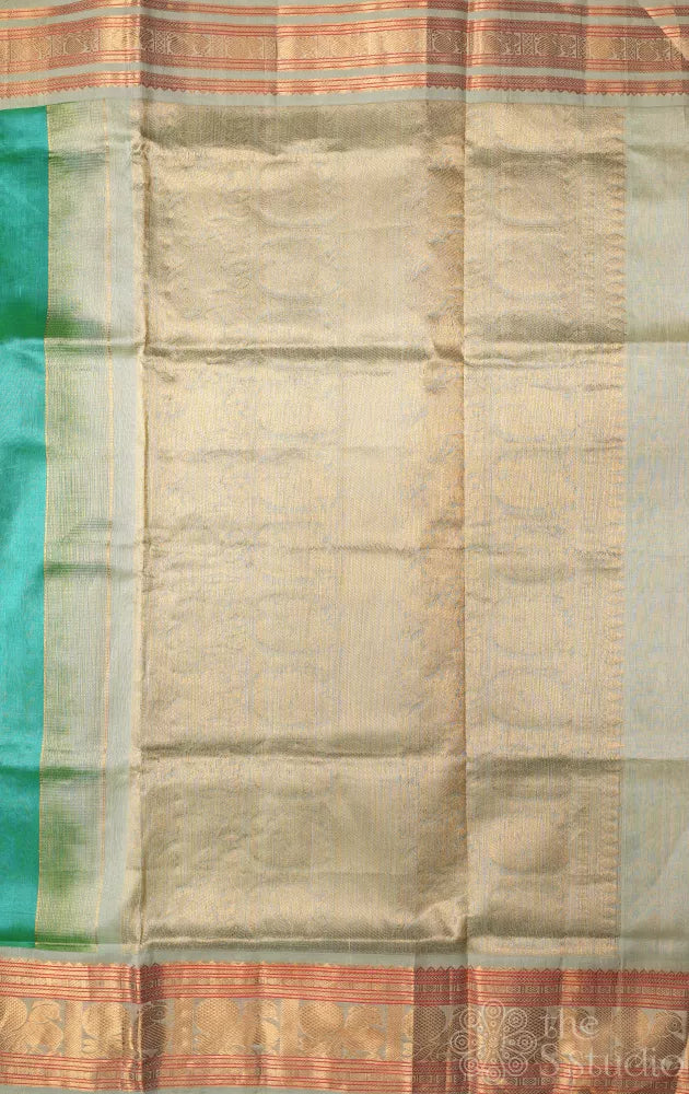 Sea green plain silk cotton saree with korvai border