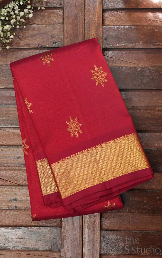 Maroon kanchipuram silk saree with all over buttas and getti border