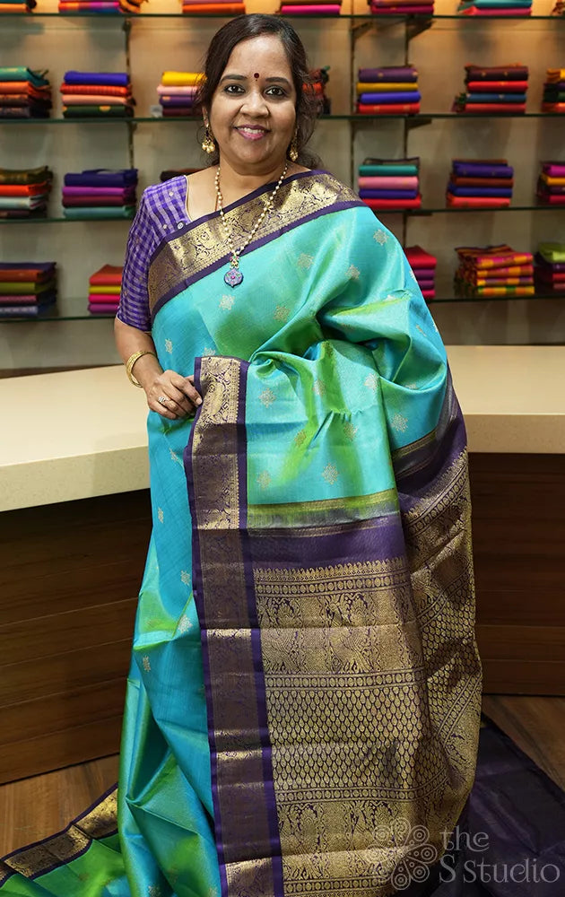 Sea green vairaoosi kanchipuram silk saree with korvai border