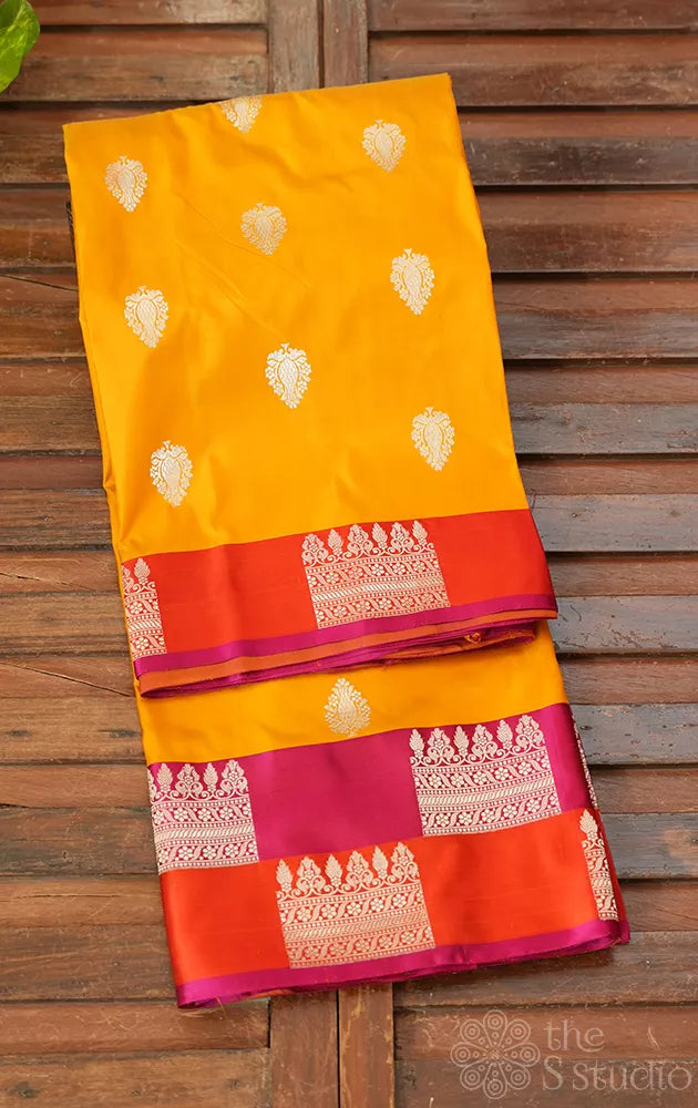 Mango yellow katan banarasi silk saree with double colour border