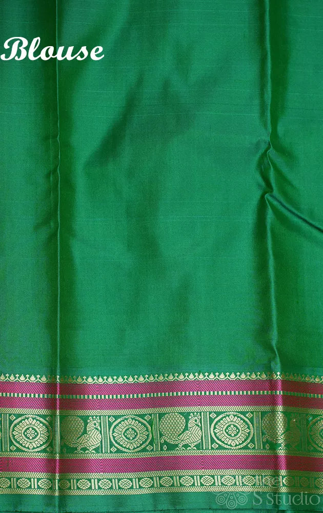 Salmon pink threadwork kanjivaram saree with korvai green border