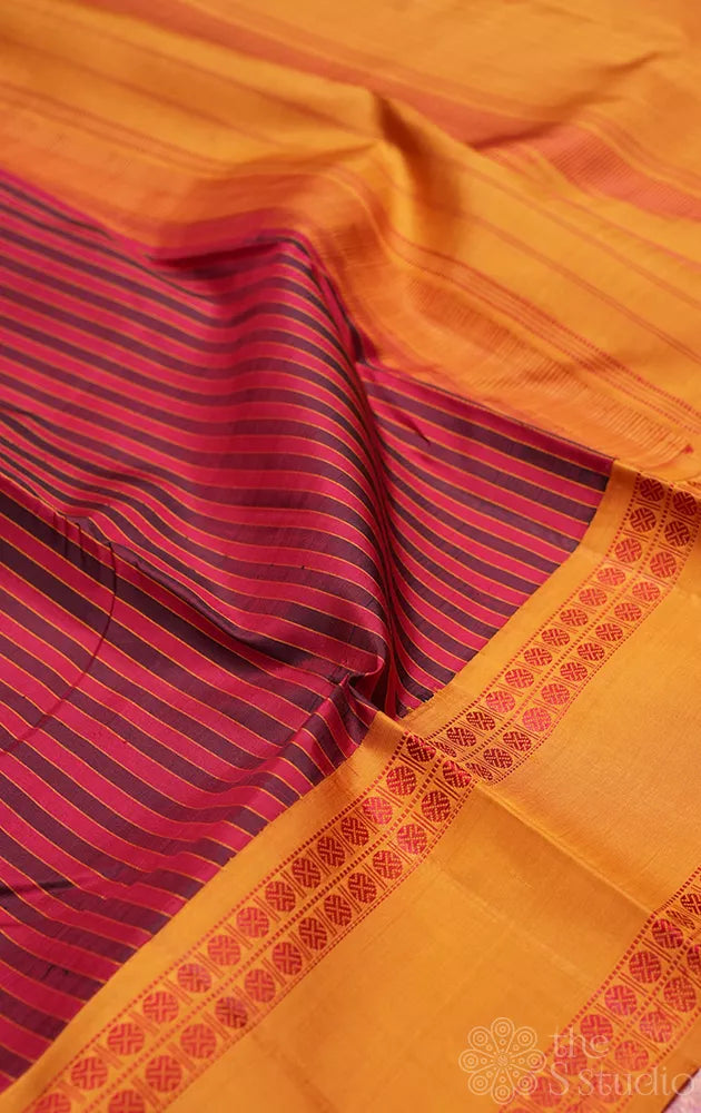 Maroon kanchi silk saree with threadwork kalakshethra design border