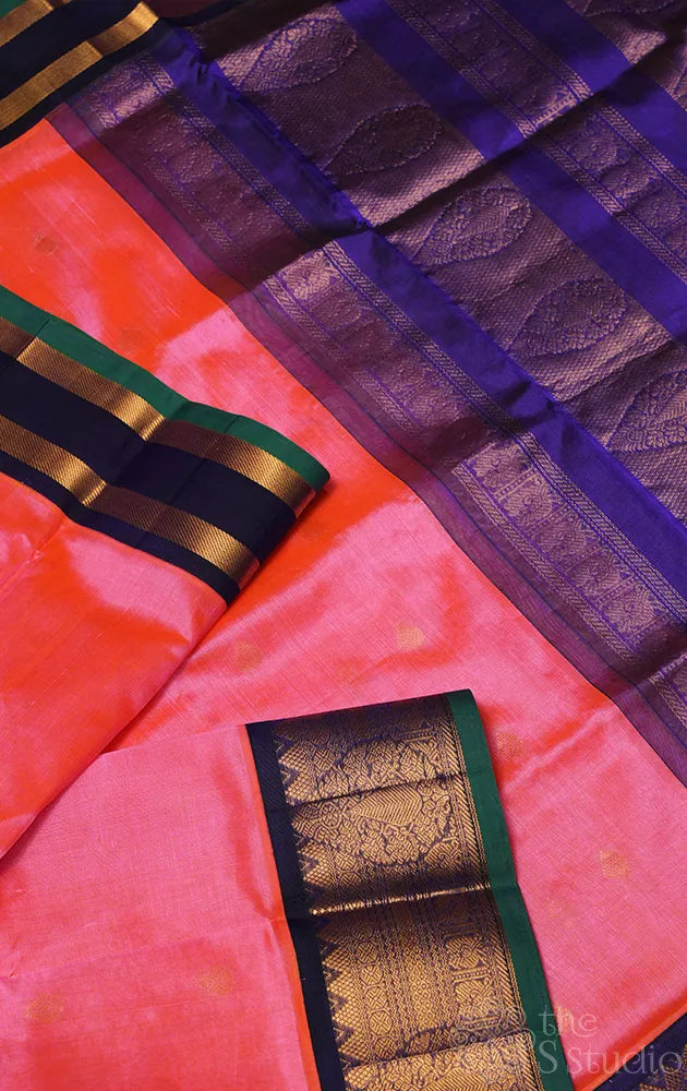 Peach silk cotton saree with korvai navy blue border