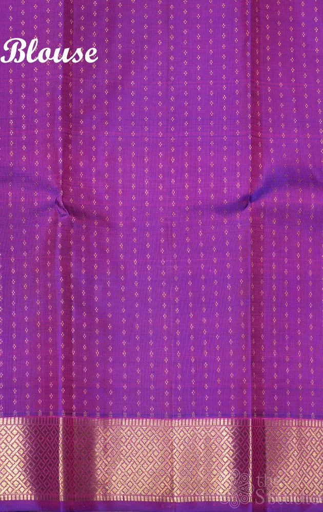 Bluish green kanchi silk saree with vanasingharam design and getti border