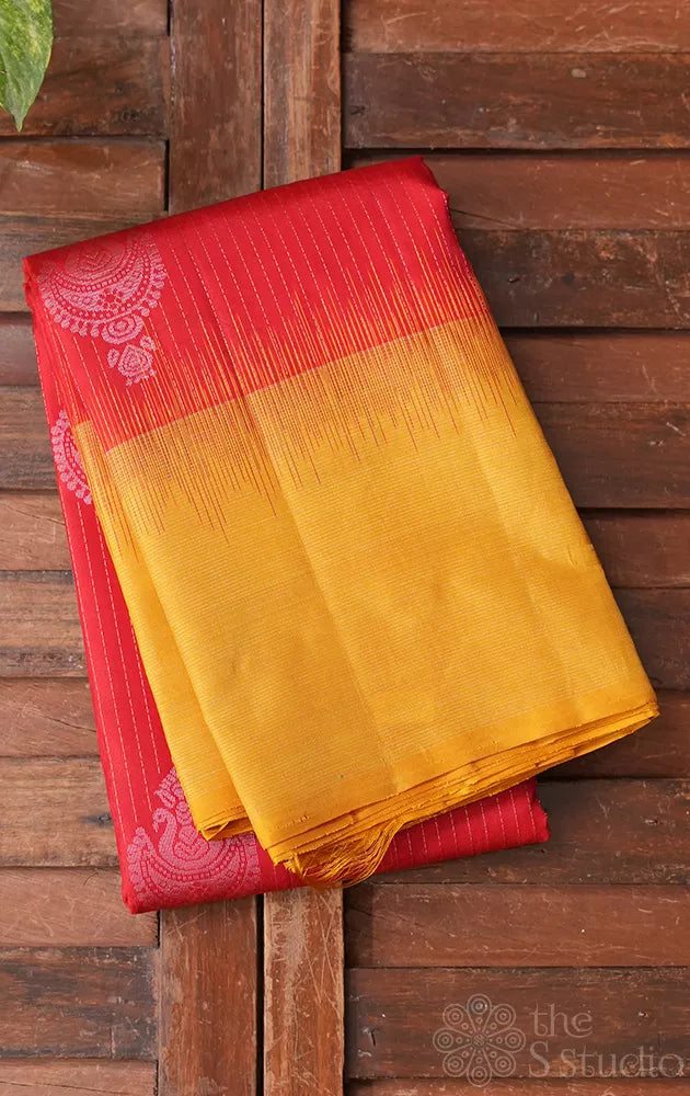 Red soft silk saree with mustard border