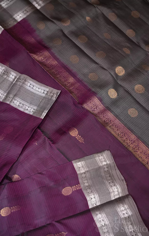 Purple soft silk saree with grey silver zari rettaipet border