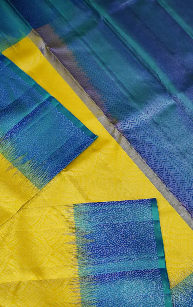 Neon green soft silk saree with peacock blue border