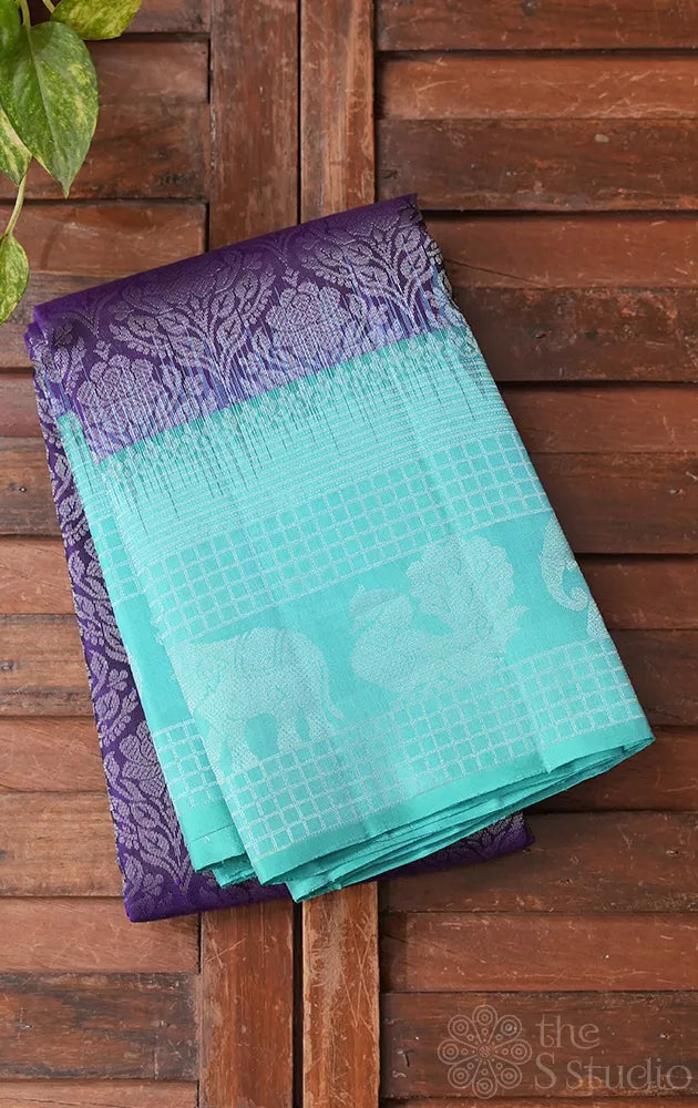 Violet soft silk saree with sea blue border and pallu