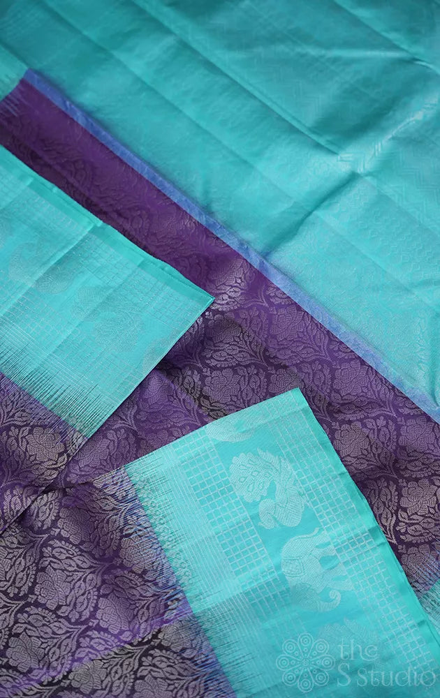 Violet soft silk saree with sea blue border and pallu