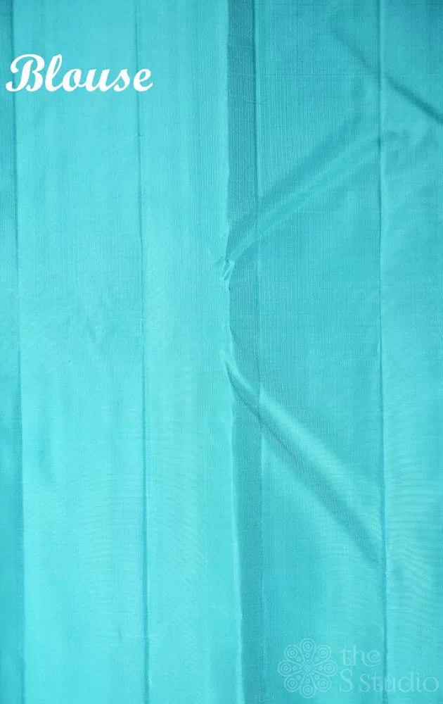 Violet soft silk saree with sea blue border and pallu