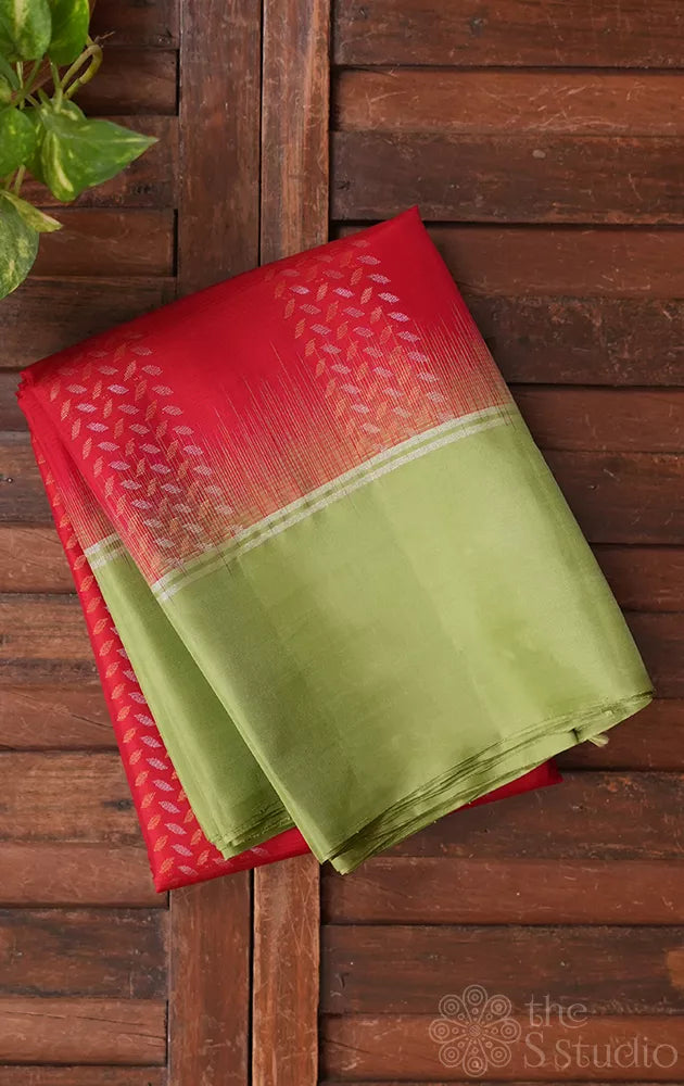 Red soft silk saree with elachi green border