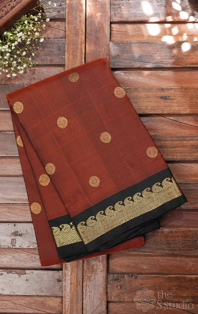 Rust kanjivaram silk saree with black border