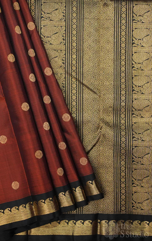 Rust kanjivaram silk saree with black border